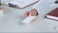 Portrait of young business woman holding blank white business card Royalty Free Stock Photo