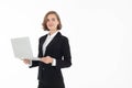 Portrait of young business woman holding laptop with hand pointing up Royalty Free Stock Photo