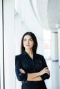 Portrait of young pretty business woman in the office. Royalty Free Stock Photo