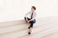 Portrait of young business woman using laptop at office smiling