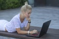 Portrait of young business woman using laptop Royalty Free Stock Photo