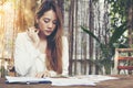 Portrait of a young business women thinking about something for Royalty Free Stock Photo