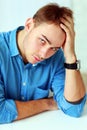 Portrait of a young businessman in blue shirt