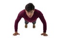 Portrait of young businessman doing push ups Royalty Free Stock Photo
