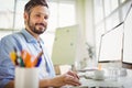 Portrait of young businessman working in creative office Royalty Free Stock Photo