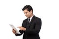 Portrait young businessman working on new tablet, mobile phone in white studio. Portrait of a confident business man in black suit Royalty Free Stock Photo