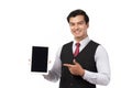 Portrait young businessman working on new tablet, mobile phone in white studio. Portrait of a confident business man in black suit Royalty Free Stock Photo