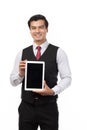 Portrait young businessman working on new tablet, mobile phone in white studio. Portrait of a confident business man in black suit Royalty Free Stock Photo