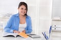 Portrait of a young businesswoman in blue blouse. Royalty Free Stock Photo