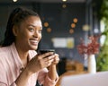 Portrait Of Young Businesswoman With Coffee Working On Laptop Sitting In Cafe Or Office Royalty Free Stock Photo