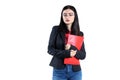 Portrait of a young businesswoman in glasses with a red folder and pen female, person, success Royalty Free Stock Photo