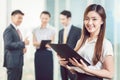 Portrait of young businesswoman holding folder Royalty Free Stock Photo