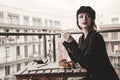 Portrait of young businesswoman sitting near a table Royalty Free Stock Photo