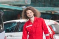 Portrait of a young car mechanic in repair garage, Technician man working in auto repair shop