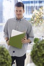 Portrait of young casual office worker smiling Royalty Free Stock Photo