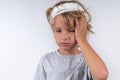 Portrait young caucasian cute boy blond hair with trauma injury and bandage head. Isolated on white background. Boy