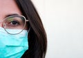 Young caucasian girl wearing a corona virus protection mask