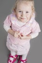 Portrait of Young Caucasian Little Girl Trying On Mother's Shoes Royalty Free Stock Photo