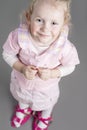 Portrait of Young Caucasian Little Girl Trying On Mother's Shoes Royalty Free Stock Photo