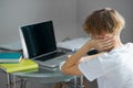 Portrait of young caucasian teen boy studying at home Royalty Free Stock Photo