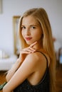 portrait of a young caucasian woman with blond hair and bright lips, a beautiful lady in an evening dress, a woman with Royalty Free Stock Photo