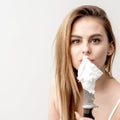 Woman holding knife with shaving foam Royalty Free Stock Photo