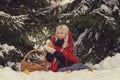 Portrait of a young caucasian woman in russian style on a strong frost in a winter snowy day. Russian model girl. Royalty Free Stock Photo