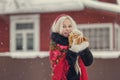 Portrait of a young caucasian woman in russian style on a strong frost in a winter snowy day. Russian model girl Royalty Free Stock Photo