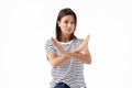 Portrait of young caucasian woman showing NO gesture on a white background Royalty Free Stock Photo