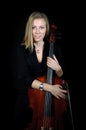 Portrait of young cellist with cello