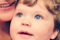 Portrait of a young child with blue eyes close-up Royalty Free Stock Photo