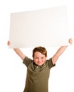 Portrait of young child boy holding blank sign Royalty Free Stock Photo