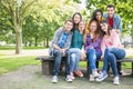 Portrait of young college students in park Royalty Free Stock Photo