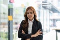 Portrait young confident Asian business woman leader, successful entrepreneur, elegant professional company executive Royalty Free Stock Photo