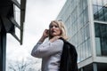 Portrait of a young confident business woman outdoors in a finance environment Royalty Free Stock Photo