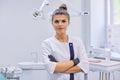 Portrait of young confident dentist doctor woman, female with arms crossed Royalty Free Stock Photo