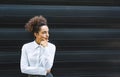 Portrait of young confident successful business woman standing outside office building. Educated independent female team leader Royalty Free Stock Photo