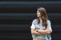 Portrait of young confident successful business woman standing outside office building. Educated independent female team leader Royalty Free Stock Photo