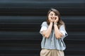 Portrait of young confident successful business woman standing outside office building. Educated independent female team leader Royalty Free Stock Photo