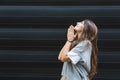 Portrait of young confident successful business woman standing outside office building. Educated independent female team leader Royalty Free Stock Photo