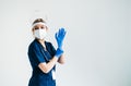 Portrait of young confident woman nurse hospital worker in medical protective mask isolated on white background Royalty Free Stock Photo