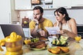 Young couple calculating bills at home Royalty Free Stock Photo