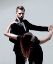 Portrait Of Young Couple Dancing Over Grey Background Royalty Free Stock Photo