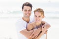 Portrait of young couple embracing each other on the beach Royalty Free Stock Photo