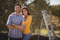 Portrait of young couple embracing at farm Royalty Free Stock Photo