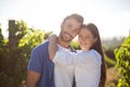 Portrait of young couple embracing at vineyard Royalty Free Stock Photo