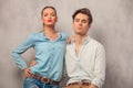 Portrait of young couple holding each other in studio Royalty Free Stock Photo