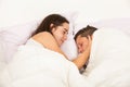 Portrait of a young couple in love in a bed Royalty Free Stock Photo