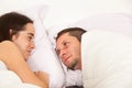 Portrait of a young couple in love in a bed Royalty Free Stock Photo