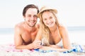 Portrait of young couple lying on the beach Royalty Free Stock Photo